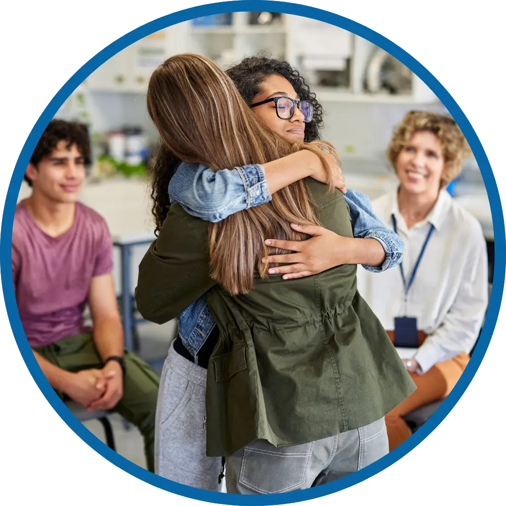 Group Therapy two people hugging